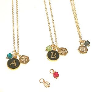 Initial birthstone and zodiac necklaces